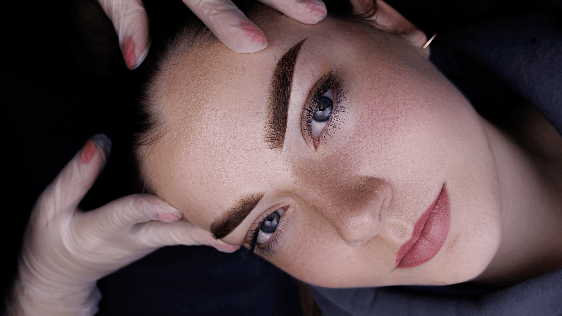 Brow shaping treatment in progress